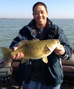 Big Lake St. Clair smallmouth bass are chomping like this chunker 2013 Michigan catch-and-release opening weekend bass caught by a GreatLakesBass.com member