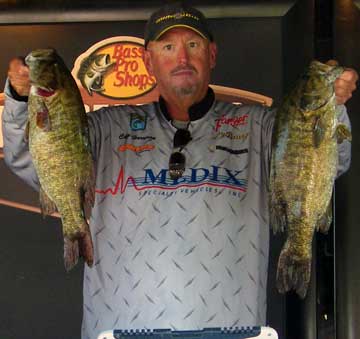 Pro angler Chip Harrison with two nice Lake St. Clair smallmouth bass from the 2010 Detroit River BASS Northern Open