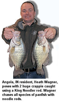 Angola, Indiana resident Heath Wagner poses with 2 huge crappie caught using a King Noodler rod. Wagner chases all species of panfish with noodle rods.