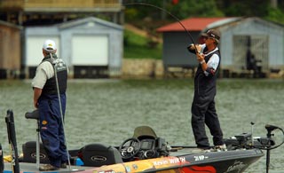 Bassmaster Elite angler Kevin Wirth sets the hook on a nice bass