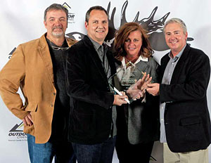 Receiving a Golden Moose Award for The Bassmasters TV show were (L) Steve Bowman, director of Web Content for JM Associates, Mike McKinnis, producer, Angie Thompson, Business Development director, B.A.S.S., and John Skrabo, B.A.S.S. sales