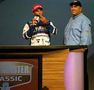 Federation Nation national champion Brandon Palaniuk pays tribute to Bryan Kerchal by blowing his bass whistle at the 2011 Bassmaster Classic