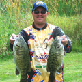 Don Watts with two of giant Indian River smallmouth bass caught during their Lake Drive championship victory