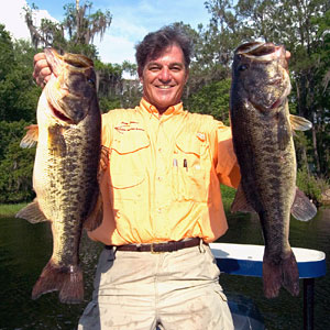 The Bass Professor Doug Hannon dies at home in Keystone Florida March 28 at 66 years of age, pictured here with two giant largemouth bass