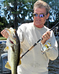 Doug Hannon dies at home March 28 - The Bass Professor is pictured here with a largemouth bass caught using one of his many innovative inventions, the WaveSpin Reel