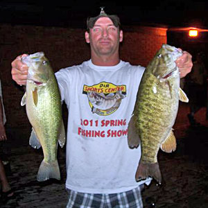 Doug Myers with two of the team's bass including the big smallmouth bass of the night from the final NBAA Division 17 Gull Lake bass tournament