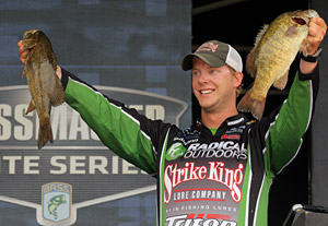 Smallmouth bass like these two professional bass angler Jonathon VanDam hold should be abundant and large when the 2013 Bassmaster Elites Series makes their first visit ever to Michigans Lake St. Clair