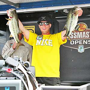 v Fletcher Shryock with two big day two largemouth bass he landed to lead the B.A.S.S. Southern Open on Lake Norman