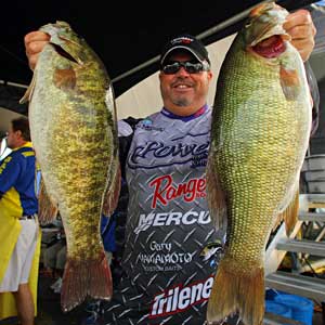 Phoenix Arizona bass pro John Murray shows off two big smallmouth bass from the 2008 Empire Chase Elite Series event