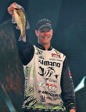 Jonathon VanDam shows off a largemouth bass during his first Bassmaster Classic appearance February 22, 2013 on Grand Lake