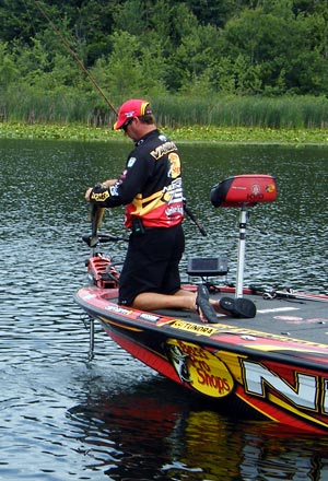 Kalamazoo Michigan Elite Series Angler Kevin VanDam lands another bass in his never ending quest to remain the best bass tournament angler in the world