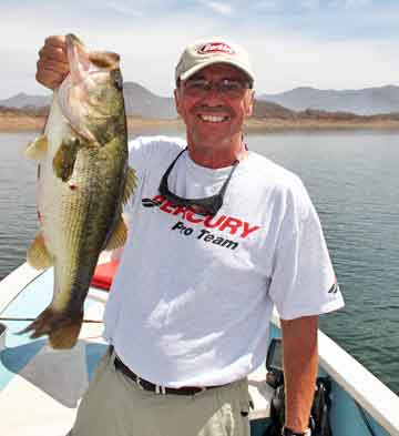 In the spring of 2008 Louie Stout visited Lake Mateos in Mexico and landed this 6-12 largemouth. Lake Mateos is a relatively new destination for bass fishing in Mexico. He was a guest of Berkley along with a group of other writes for Bassmaster magazine. This fish was the 2nd largest the group caught that week. He caught it on a 10-inch Power Worm.