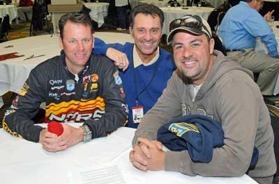 Louie Stout takes a moment to pose with Mark Zona and Kevin VanDam at the 2008 Bassmaster Classic media day. Aside from being business associates, these three have become very close friends.