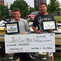 Champions Matt Belletini and Jeff Cox show off their trophies and big 10000 dollar check after 21 pounds 8 ounces of smallmouth bass win Monster Quest VIII on Lake St. Clair