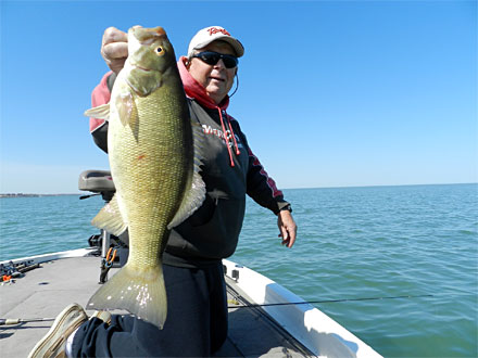 Steve Clapper with his favorite fish - a Lake Erie smallmouth bass