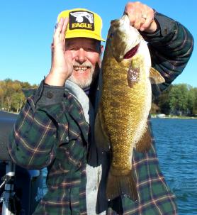 Bud Faynor with a 6 pound 13 ounce Mullett Lake smallmouth bass.
