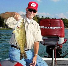 Larry Miller lands another Mullet Lake smallie over 5 1/2 pounds on a tube this time.