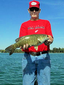Larry Miller with a 5 pound Mullet Lake Smallmouth Bass