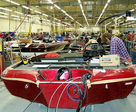 The Rigging room is next where each boat is mated with the wiring harness and components set (owner-specific bins) that matches what each owner has ordered for his or her new fishing rig.