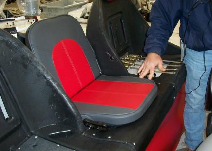 The new Z-Series middle seat is improved. It has a much taller seatback for comfort if you have a 3rd passenger.